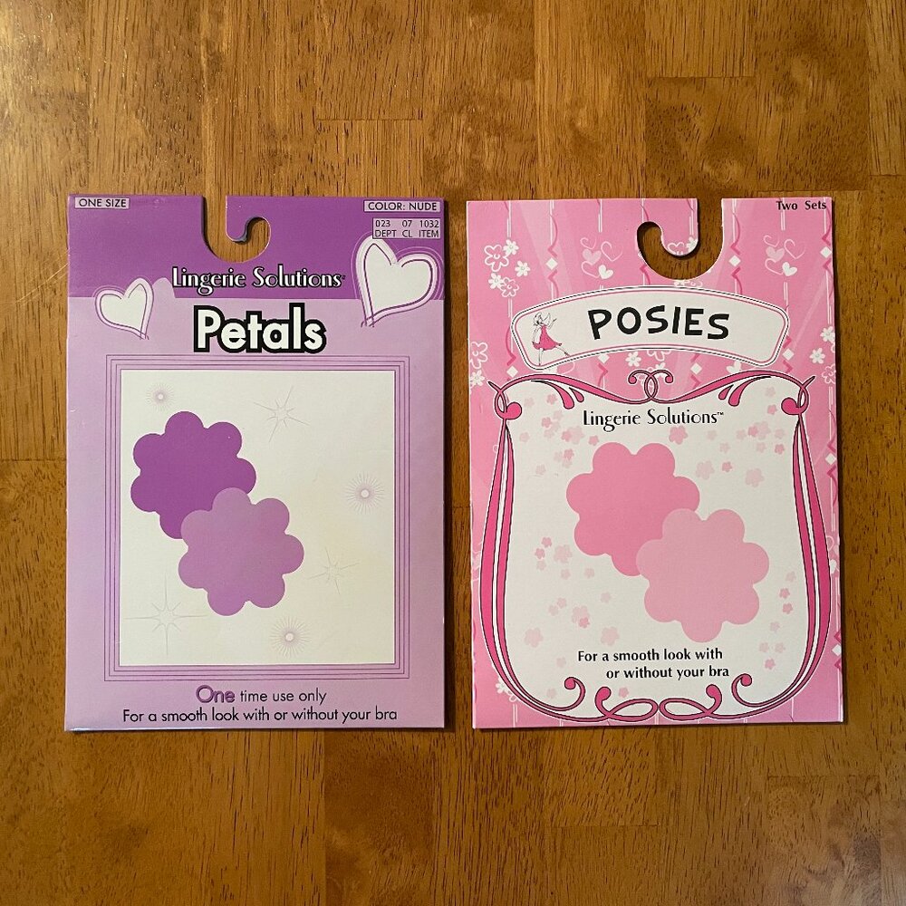 Two packages of Lingerie Solutions nude colored breast petals and posies